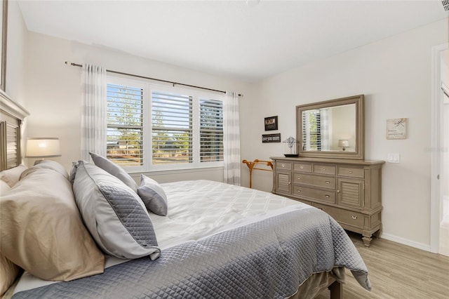 bedroom featuring light hardwood / wood-style flooring