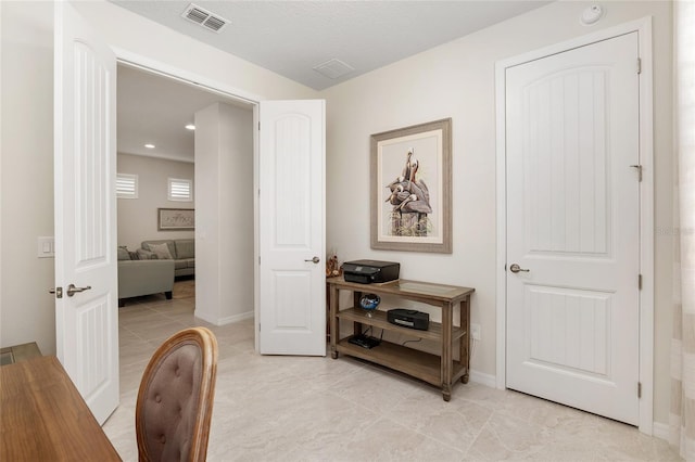 interior space featuring light tile patterned flooring