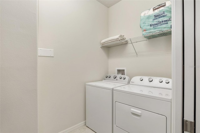 laundry room featuring washer and clothes dryer