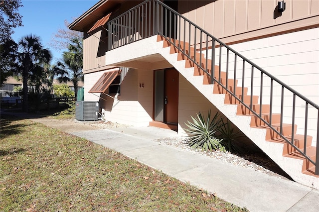 entrance to property with central AC unit