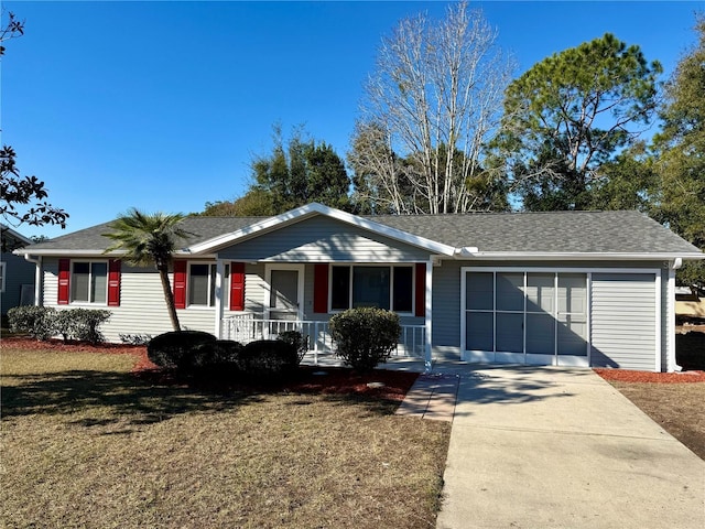 single story home with a front yard, a porch, and a garage