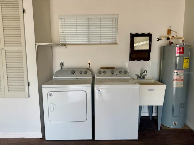 laundry room featuring washer and clothes dryer, sink, and electric water heater