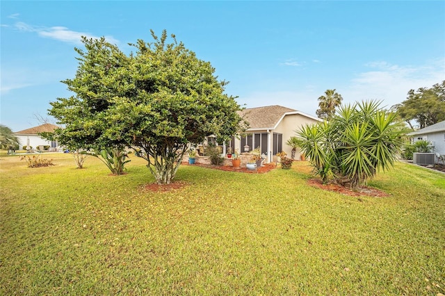 view of yard featuring central AC