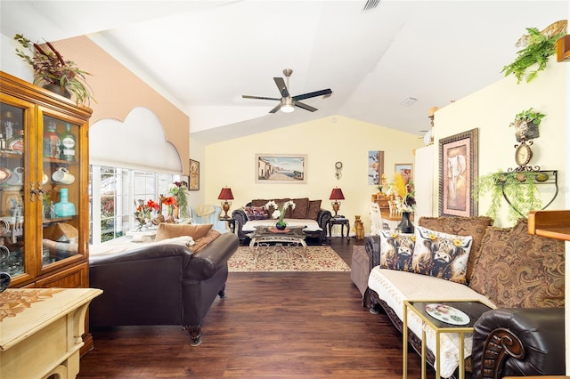 living room with ceiling fan, dark hardwood / wood-style floors, and vaulted ceiling