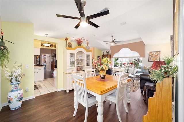 dining space featuring ceiling fan and light hardwood / wood-style flooring