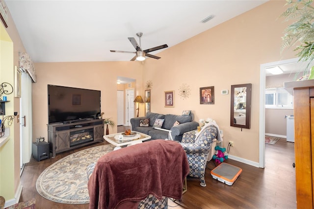 living room featuring ceiling fan, dark hardwood / wood-style flooring, and lofted ceiling