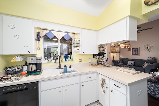 kitchen featuring dishwasher, tile patterned flooring, white cabinetry, sink, and kitchen peninsula