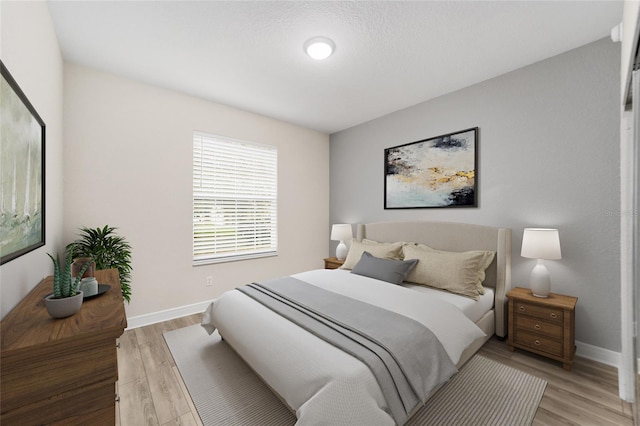 bedroom featuring light hardwood / wood-style flooring