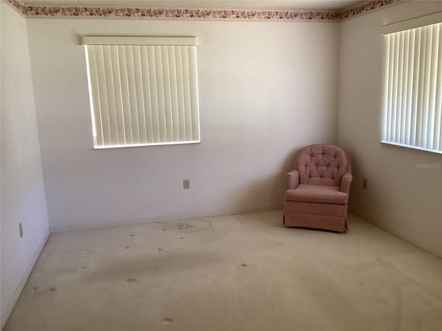 unfurnished room featuring carpet flooring