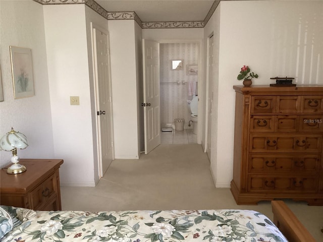 bedroom featuring light colored carpet