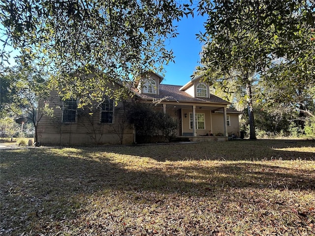 exterior space featuring a front yard