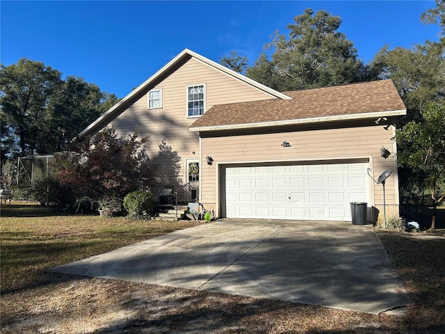 view of side of home featuring a garage