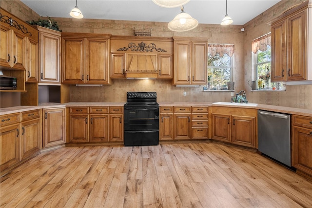 kitchen featuring pendant lighting, stainless steel dishwasher, light hardwood / wood-style flooring, and electric range