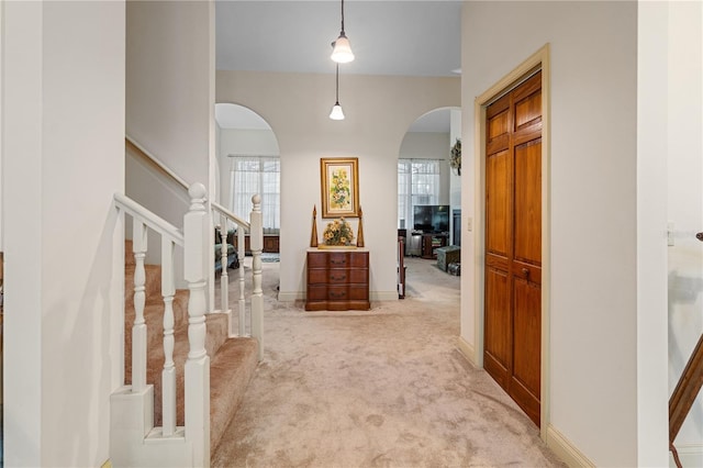 view of carpeted foyer