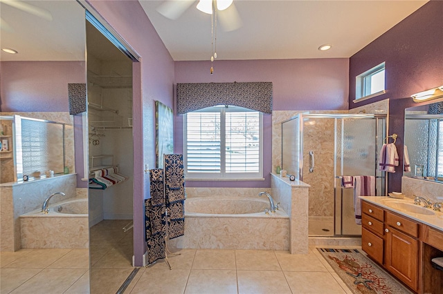 bathroom with vanity, tile patterned floors, plus walk in shower, and ceiling fan