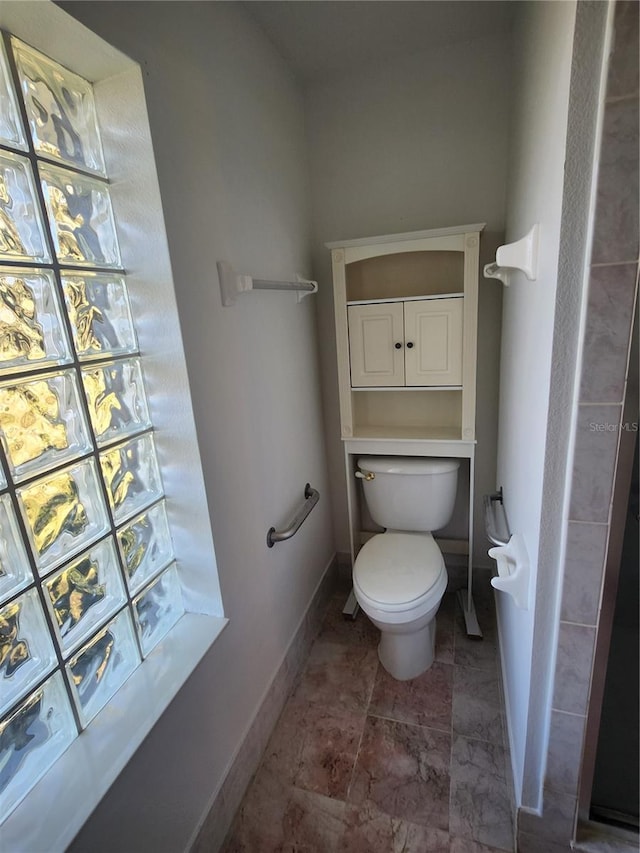 bathroom featuring toilet