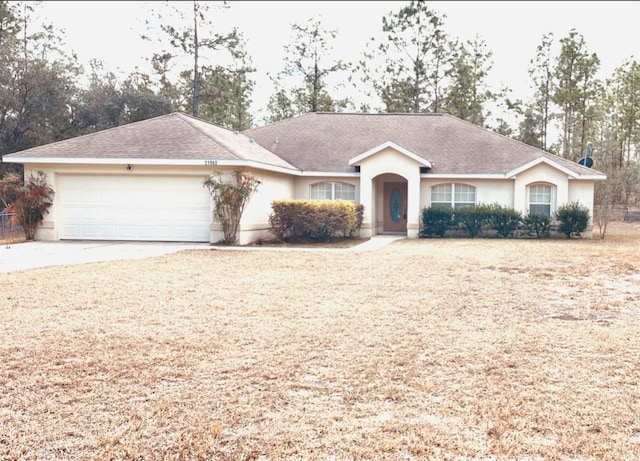 single story home with a garage