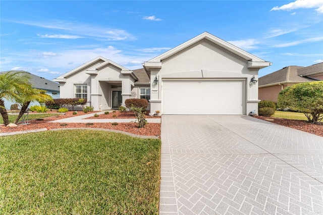 ranch-style house with a front lawn and a garage