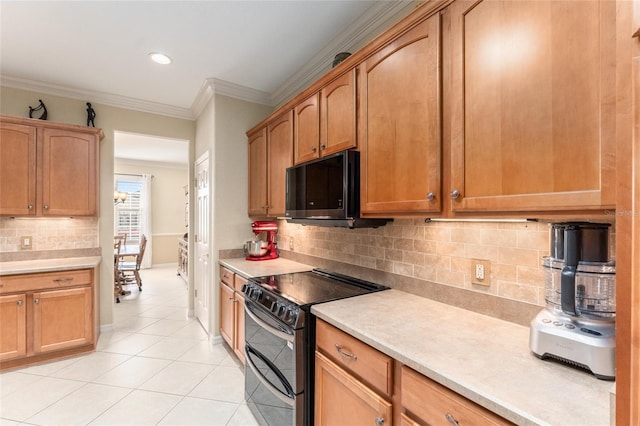 kitchen with tasteful backsplash, light tile patterned floors, range with two ovens, and ornamental molding