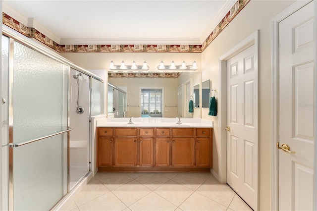 bathroom with crown molding, tile patterned floors, vanity, and a shower with shower door