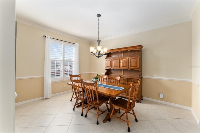 dining room with light tile patterned flooring, ornamental molding, and a notable chandelier