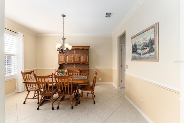 dining room featuring light tile patterned flooring, a chandelier, crown molding, and plenty of natural light