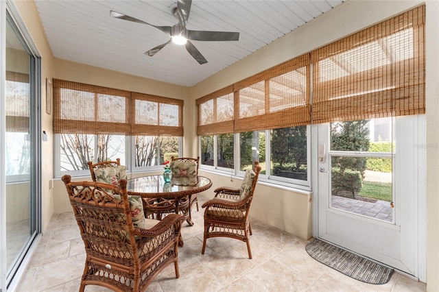 sunroom / solarium with ceiling fan