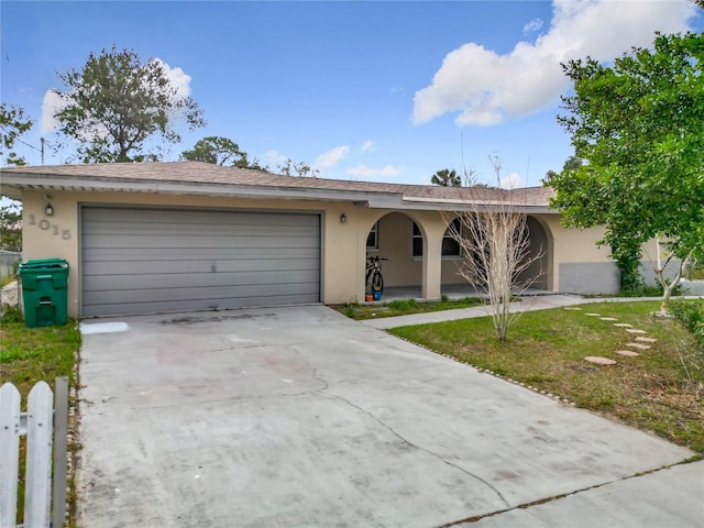 single story home with a garage