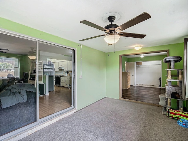 interior space featuring ceiling fan