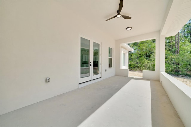6877 SW 131st Cir, Ocala, FL 34481 - view of patio / terrace featuring french doors and ceiling fan