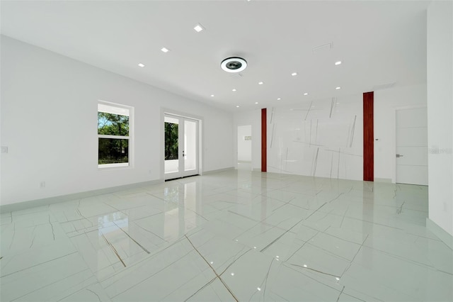 6877 SW 131st Cir, Ocala, FL 34481 - unfurnished room with baseboards and recessed lighting