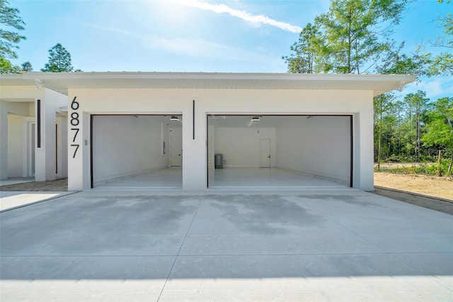 6877 SW 131st Cir, Ocala, FL 34481 - garage with concrete driveway