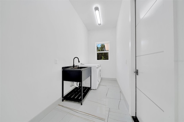 6877 SW 131st Cir, Ocala, FL 34481 - laundry area featuring separate washer and dryer and baseboards