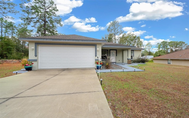 ranch-style home with a garage and a front yard