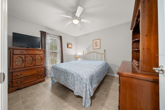 bedroom featuring ceiling fan