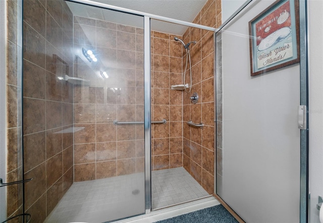 bathroom featuring an enclosed shower