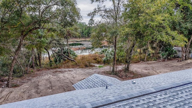 view of yard featuring a water view