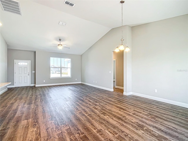 unfurnished living room with dark hardwood / wood-style flooring, lofted ceiling, and ceiling fan