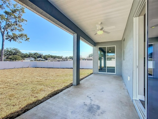 view of patio / terrace featuring ceiling fan