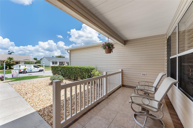 balcony featuring covered porch