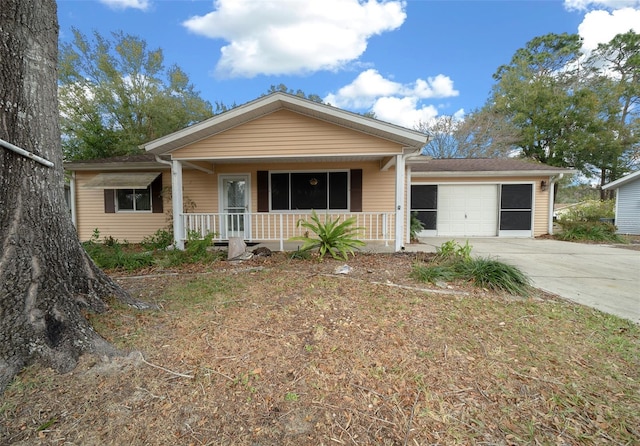 view of front of house with a garage and covered porch