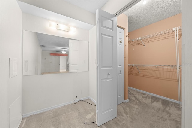 bathroom featuring a textured ceiling