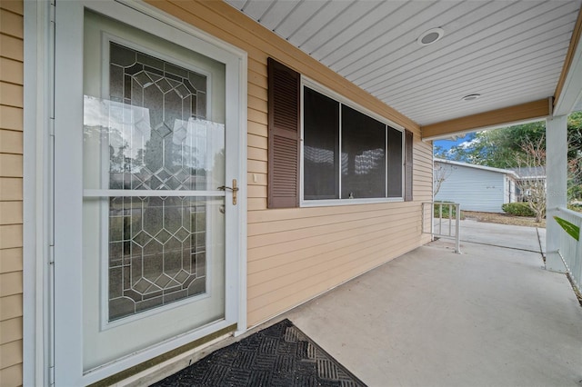 doorway to property with a porch