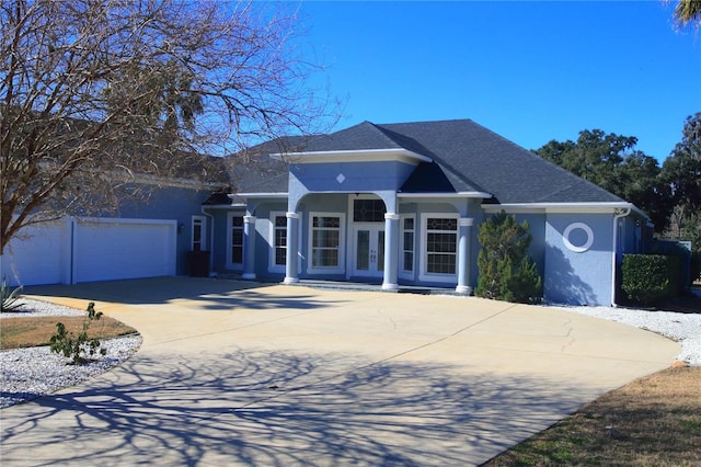 single story home with a garage