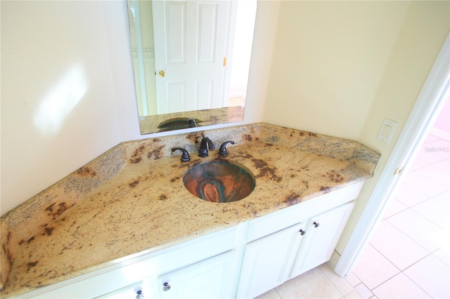 bathroom with vanity and tile patterned floors