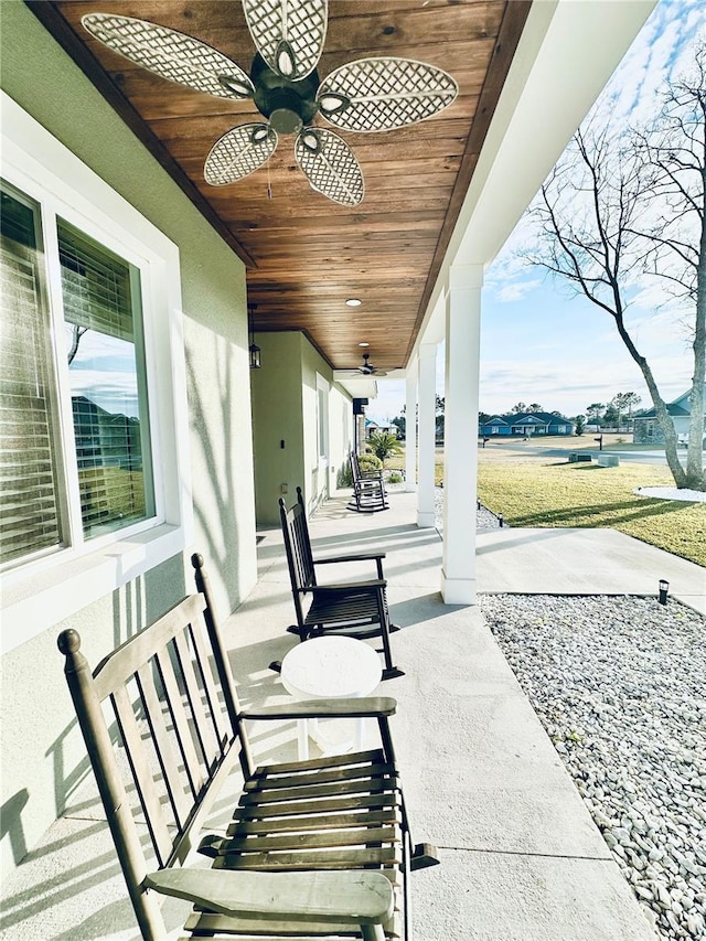 view of patio / terrace featuring ceiling fan