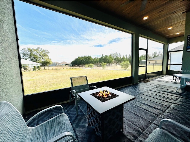 sunroom / solarium with wood ceiling