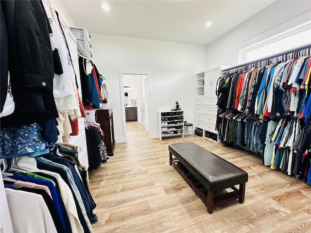 walk in closet featuring light hardwood / wood-style floors