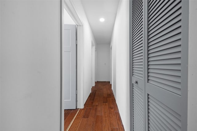 hall featuring dark wood-type flooring