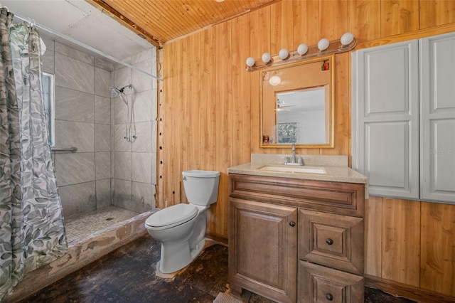 bathroom with toilet, vanity, a shower with curtain, wooden walls, and wooden ceiling